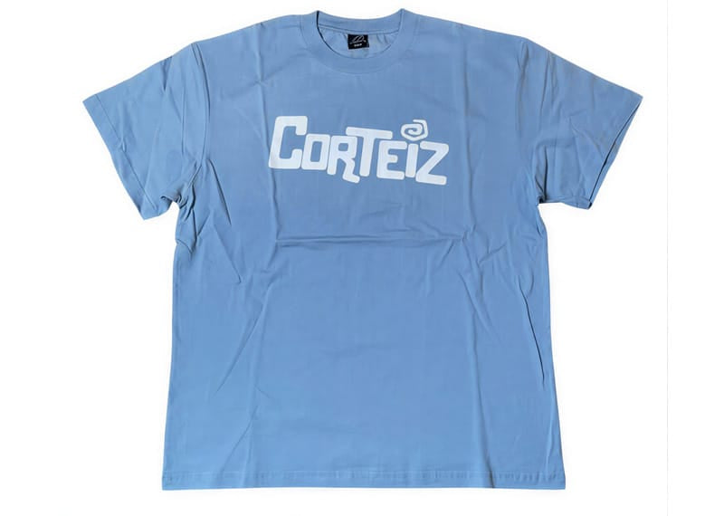 Corteiz Cartoon Logo Tee Baby Blue